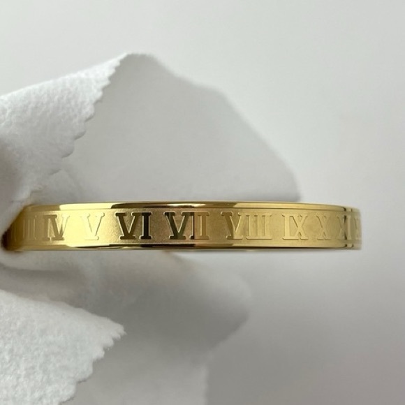 nevessTITTIES Jewelry - n e w | 18k gold roman numeral bangle